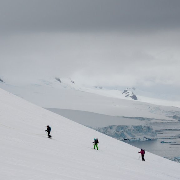 A group of ski tourers making their up the slope