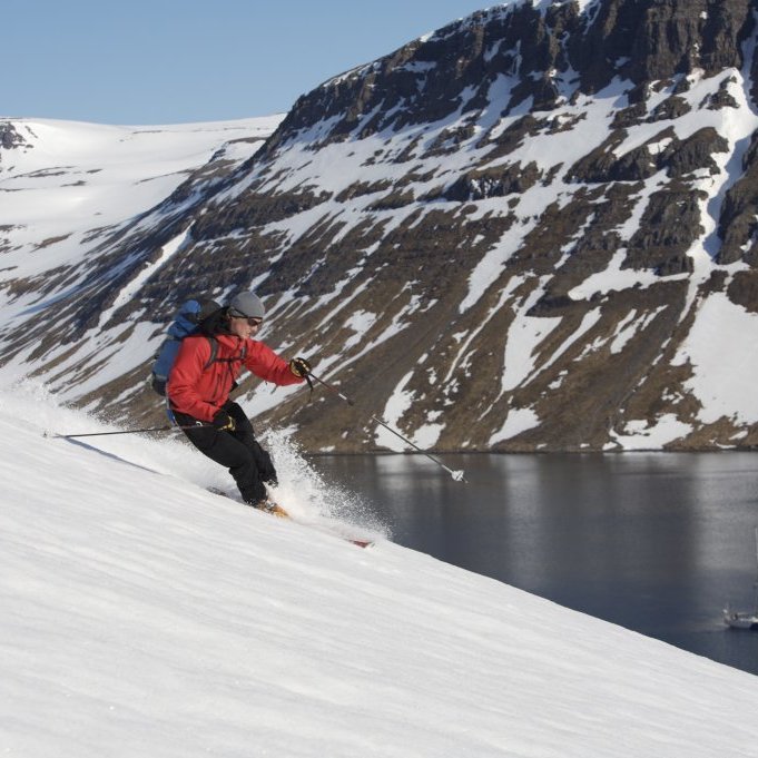 Skiing down to the fjord