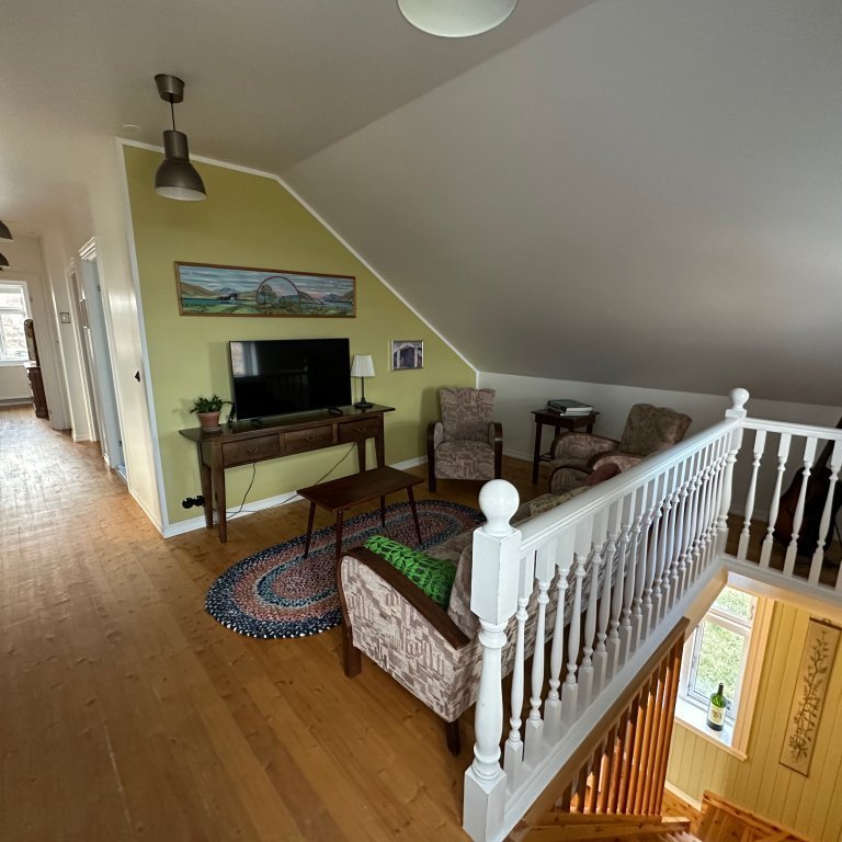 Small sitting area on the upstairs floor.