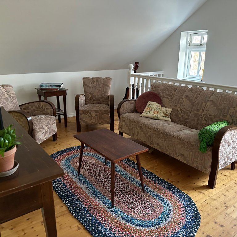Small sitting area on the upstairs floor.